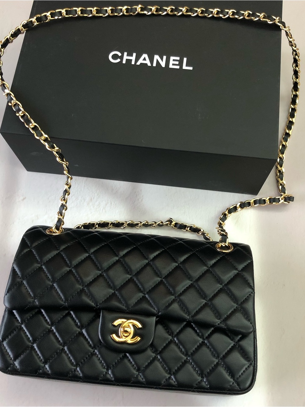 CHANEL Black Quilted Leather Shoulder Bag with Gold Chain Strap